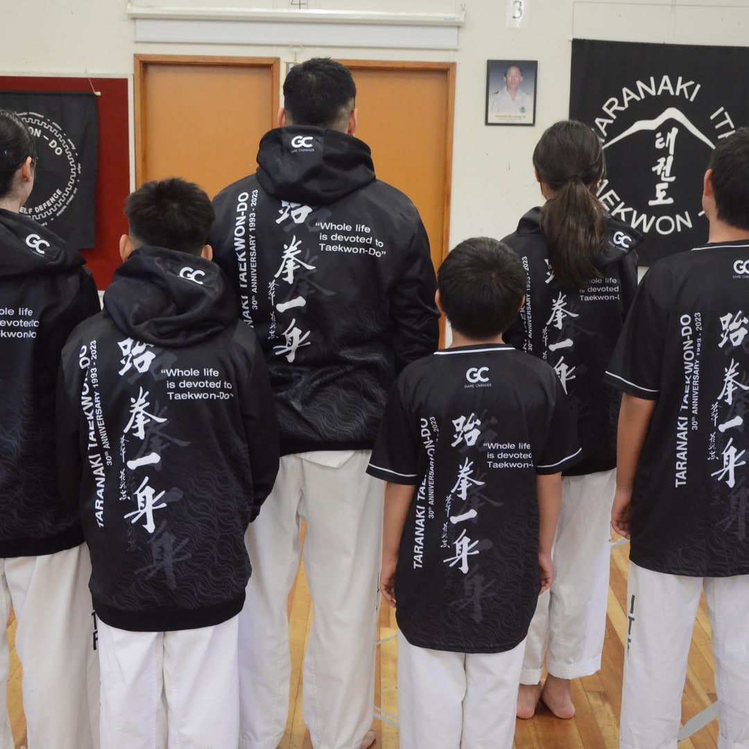 Taekwon-Do club members in custom Game Changer club hoodies