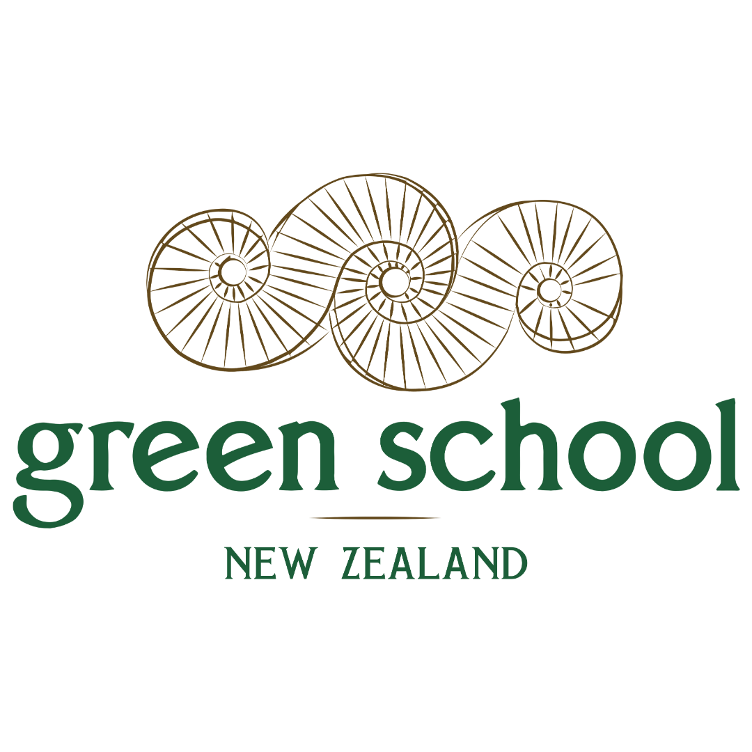 Logo of Green School New Zealand with three circular designs above the text on a white background.