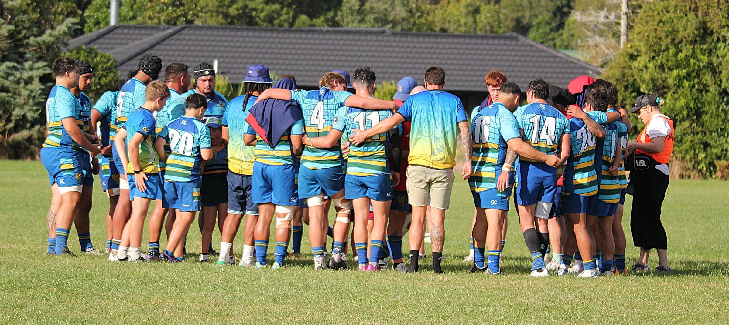 Clifton Rugby team in a pre-match huddle wearing custom Game Changer kit.