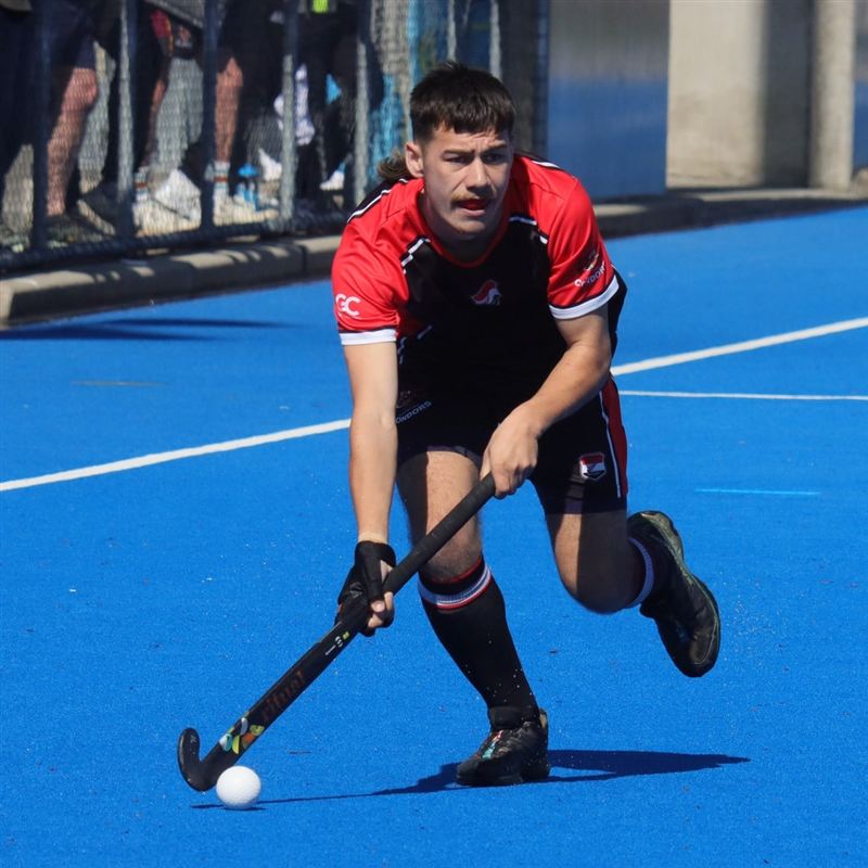 A hockey player in custom Game Changer kit.